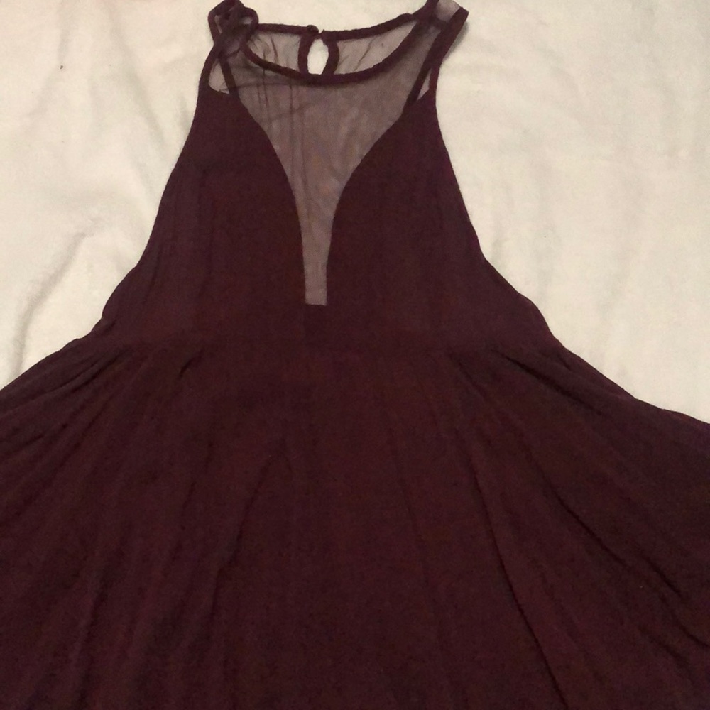Maroon shirt with a shear neckline